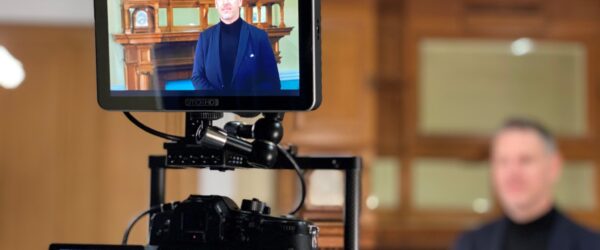 PCC John Campion behind camera screen