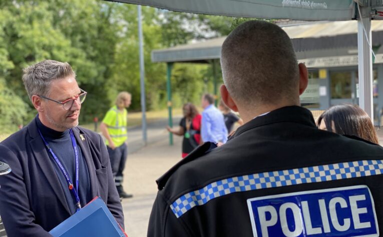 PCC John Campion speaks with the public with police