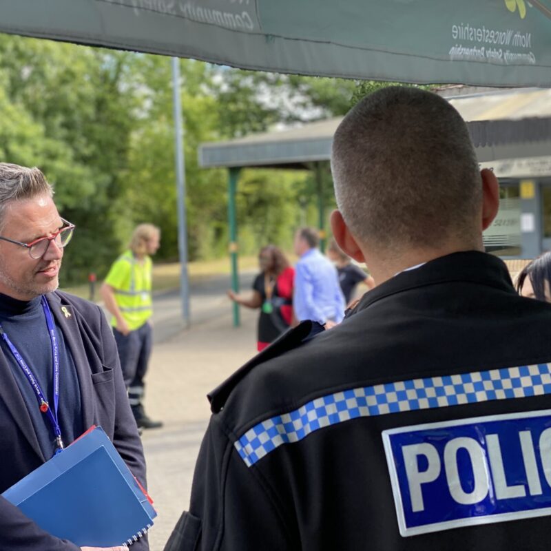 PCC John Campion speaks with the public with police